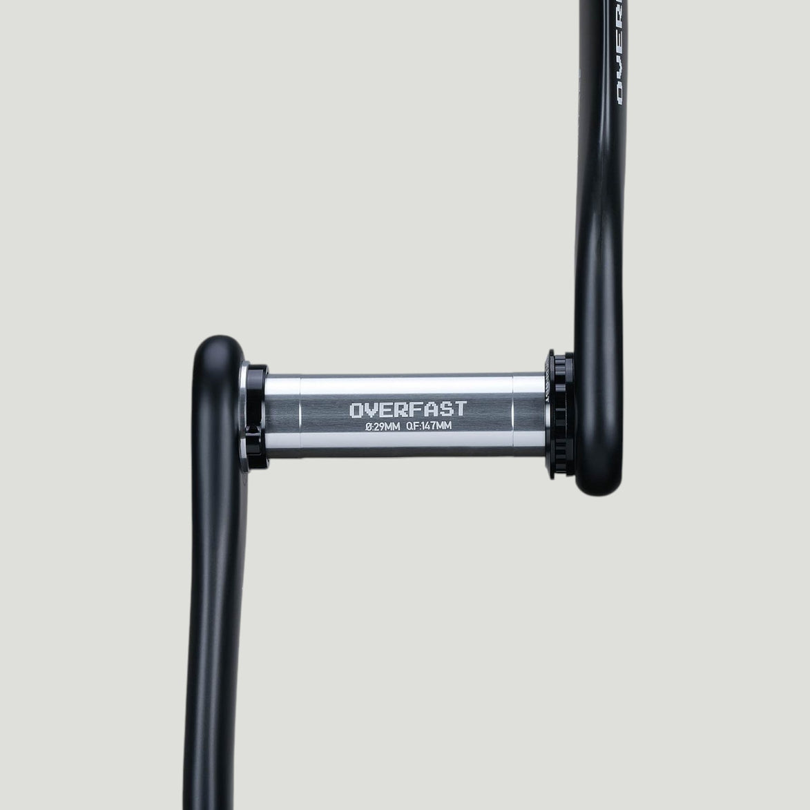 Overfast Aero Carbon Crankset DUB spindle close-up showing 28.99mm interface and axle branding