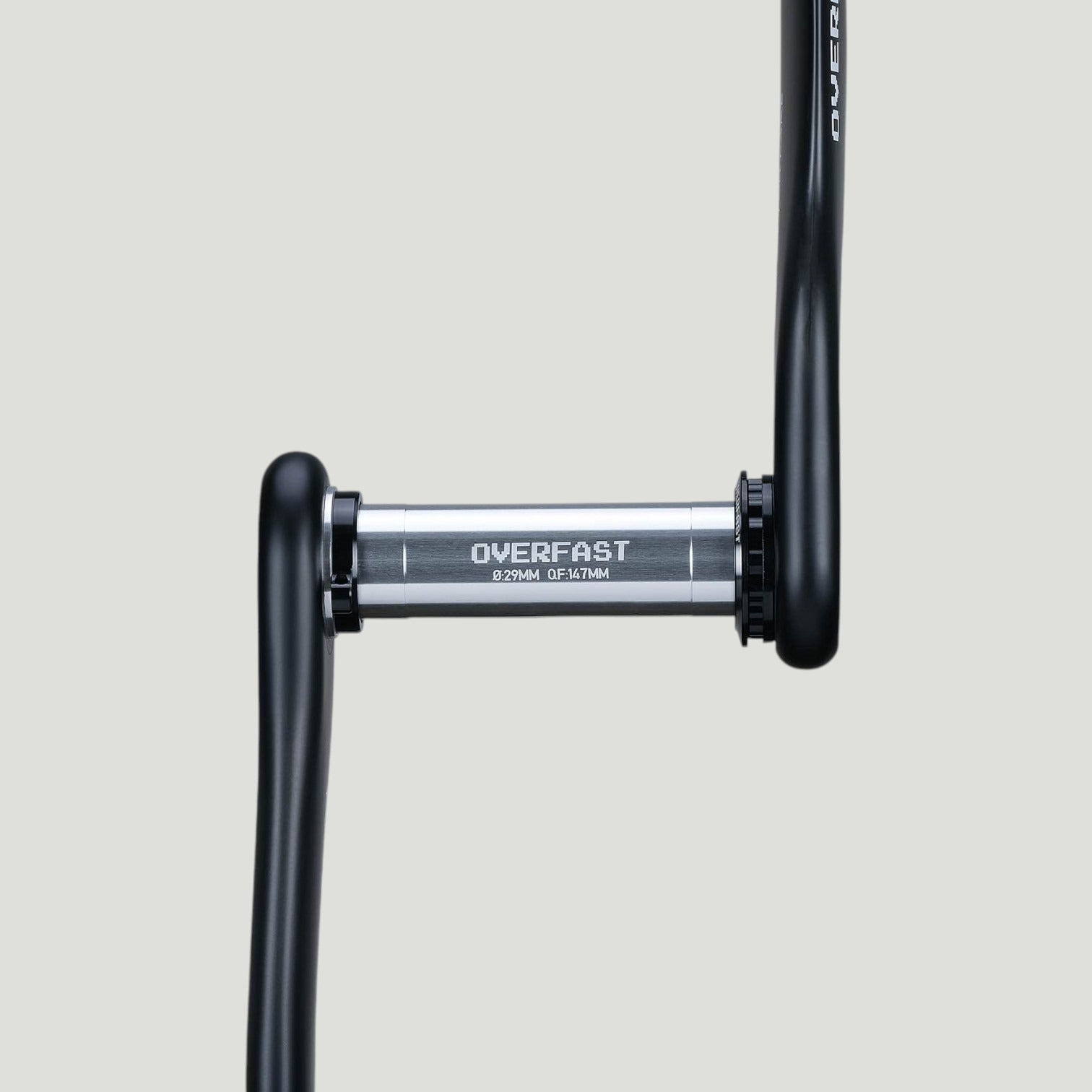 Overfast Aero Carbon Crankset DUB spindle close-up showing 28.99mm interface and axle branding