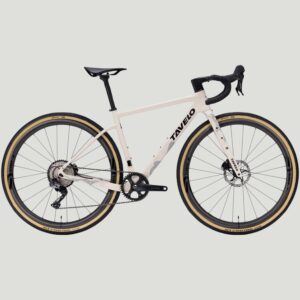 Tavelo Wild GXR Complete Bike in cream with black graphics, Shimano GRX build, and carbon gravel frame.